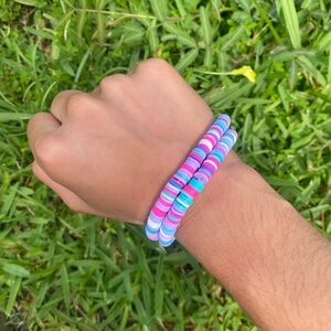Tiptoe Homemade bracelets purple, pink, and blue🩷💙💜 clay beads